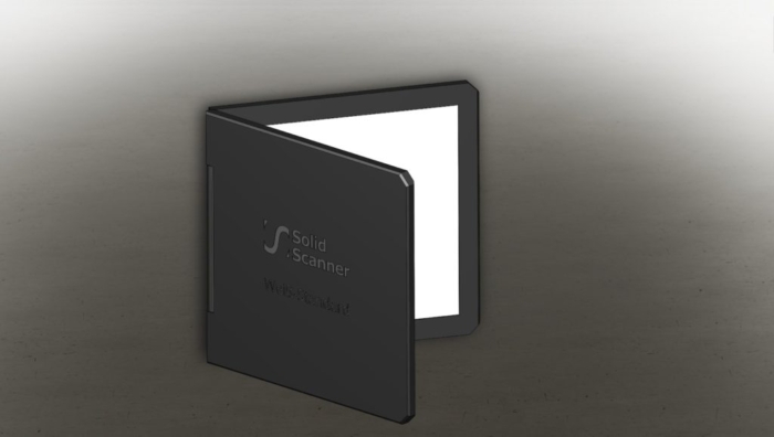 a black square object with a white light